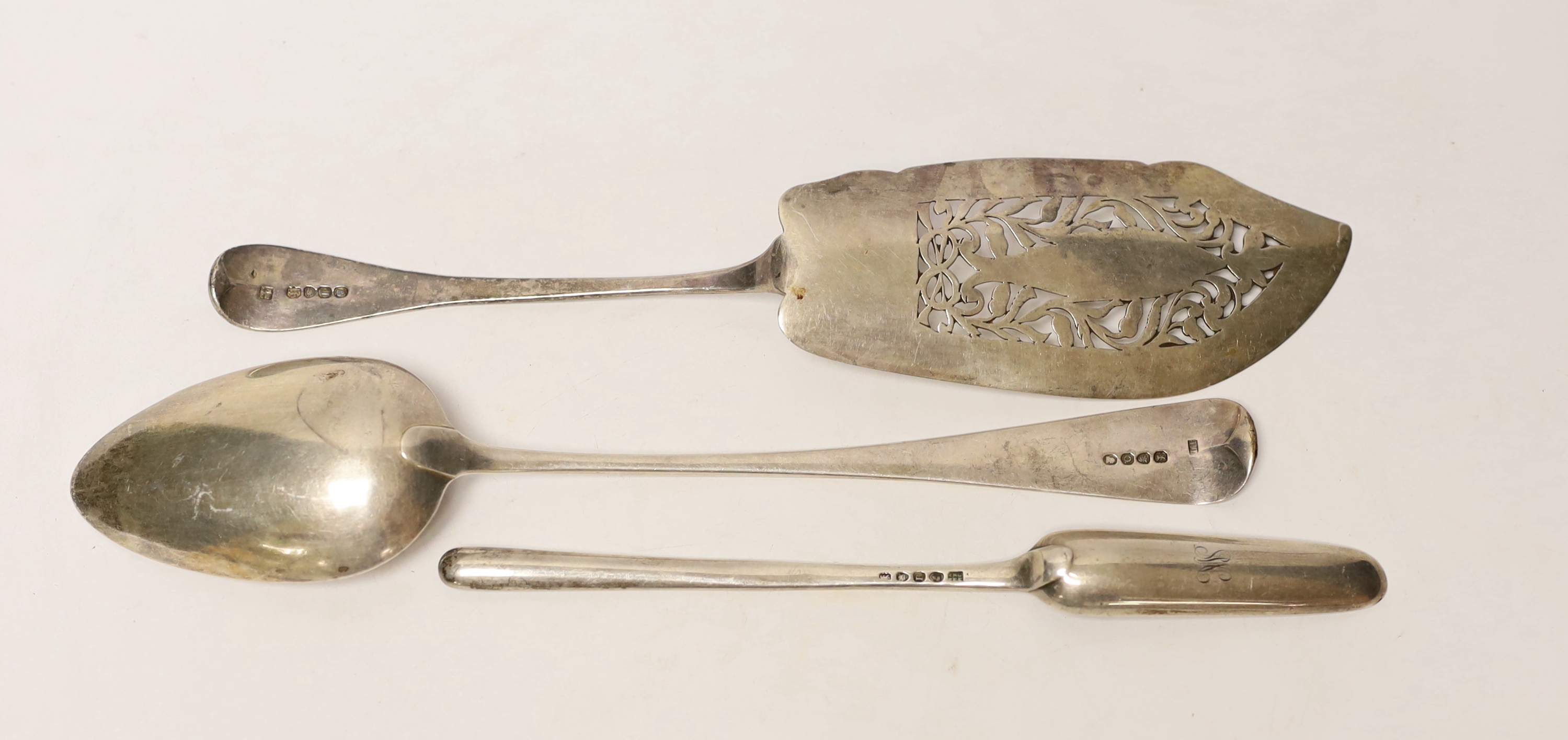 A George III silver marrow scoop, London, 1812, 22.7cm, a Victorian silver Old English pattern fish slice, London, 1838 and a George III silver basting spoon, London, 1811.